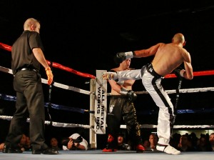 Amer Abdallah, right, about to land a kick on his opponent James Wallis.